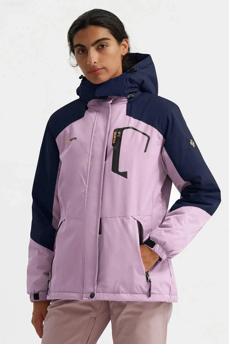 Two-tone winter jacket with a hood, featuring pink and navy blue colors.