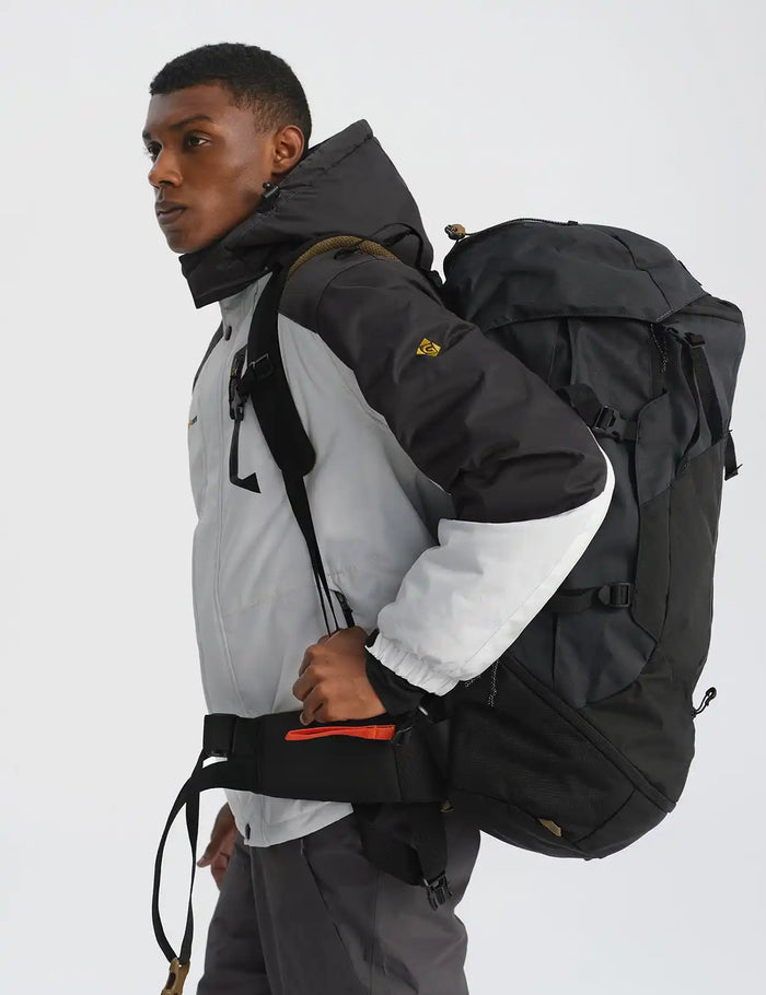 Backpack worn by a person in outdoor gear.