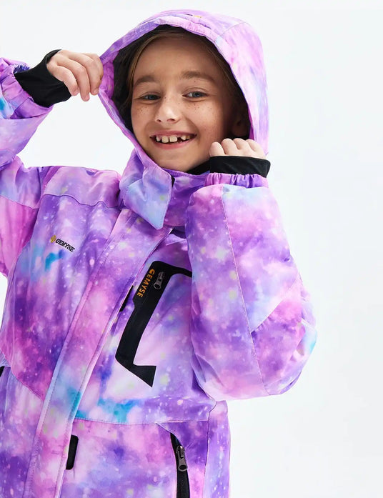 Colorful purple and pink tie-dye hooded jacket worn by a smiling child.